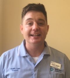 Photograph of Aaron, Nursing Assistant, Surgical Ward