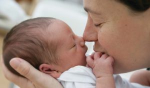 Parent holding baby